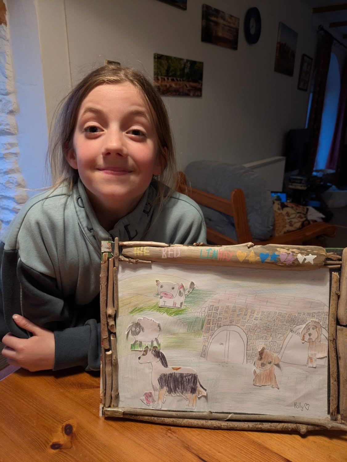 Holly with her own stunning picture of all the important features of the Red Linhay and she framed with drift wood